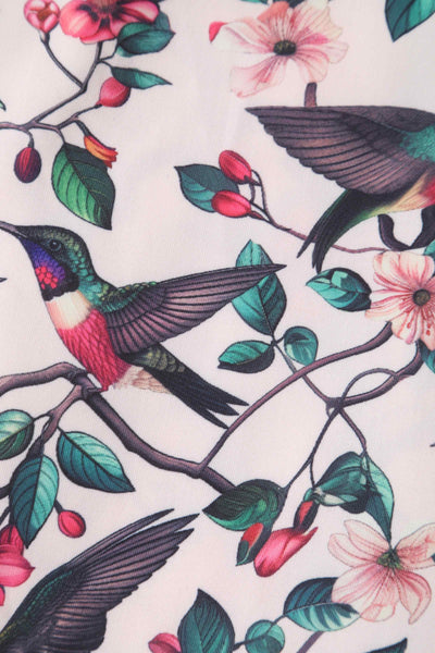 Close up view of Crossover Bust Circle Dress In White Bird Print