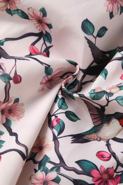 Close up view of Crossover Bust Circle Dress In White Bird Print