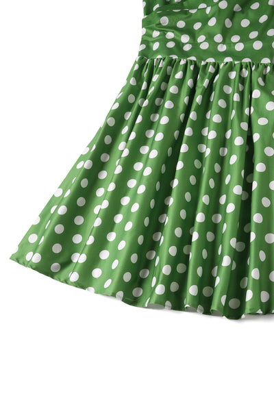 Close up view of Crossover Bust Green White Polka Dot Dress