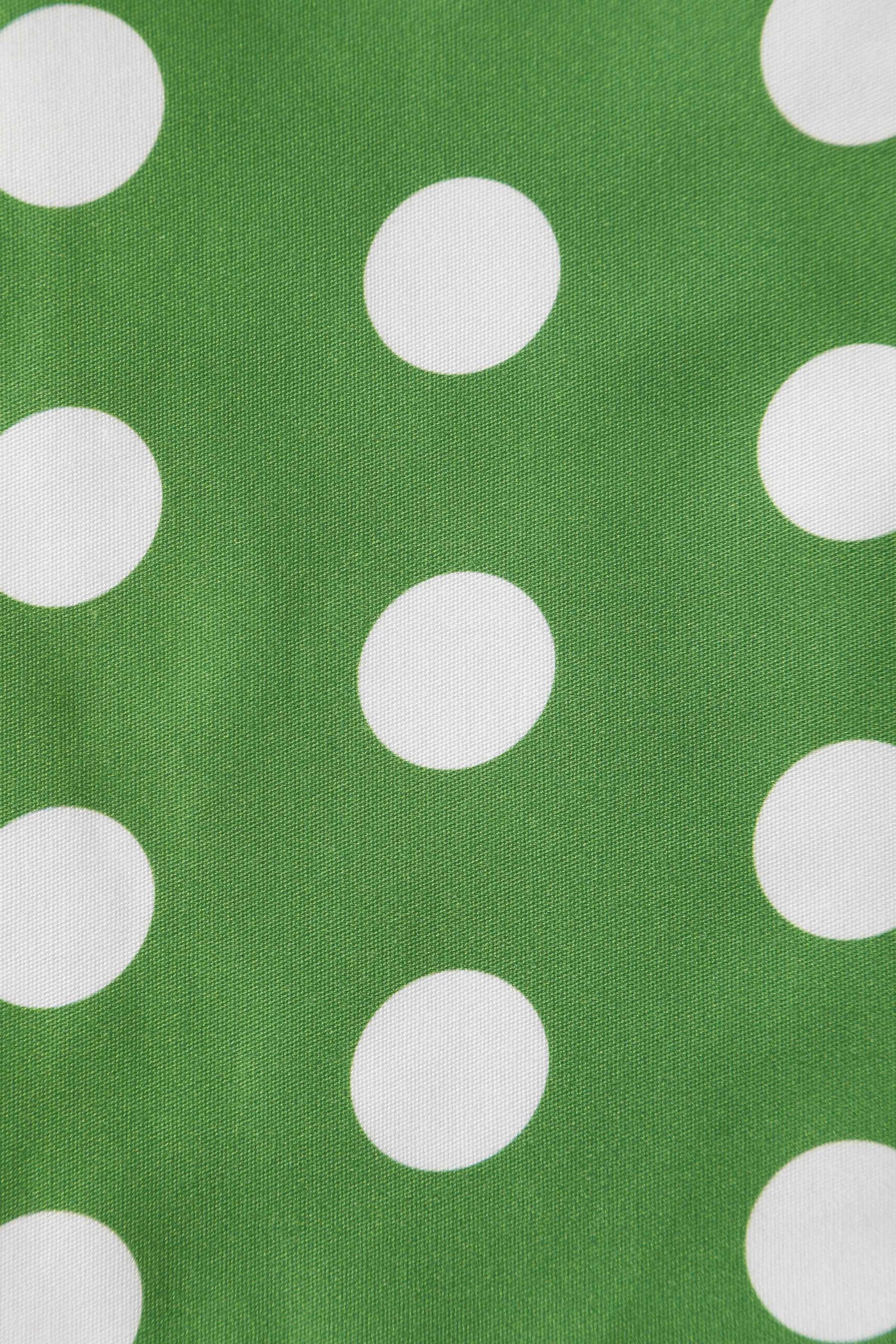 Close up view of Crossover Bust Green White Polka Dot Dress