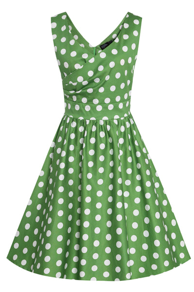 Front view of Crossover Bust Green White Polka Dot Dress