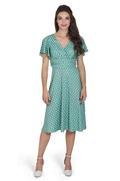 Model photo of Crossover Bust Sage Green Polka Dot Dress