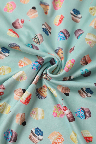 Close up view of Cupcake Print Tea Dress in Blue