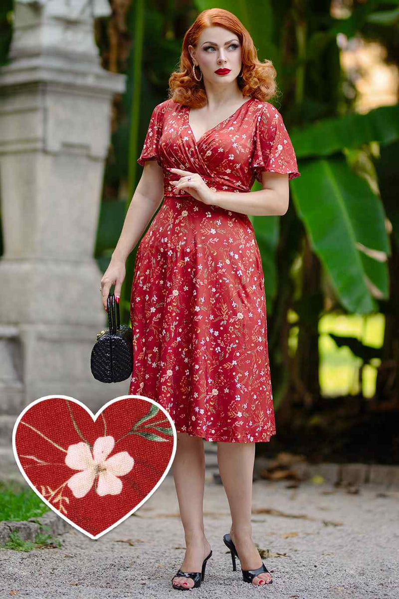 A model wearing a Burgundy Dainty Floral Tea Dress