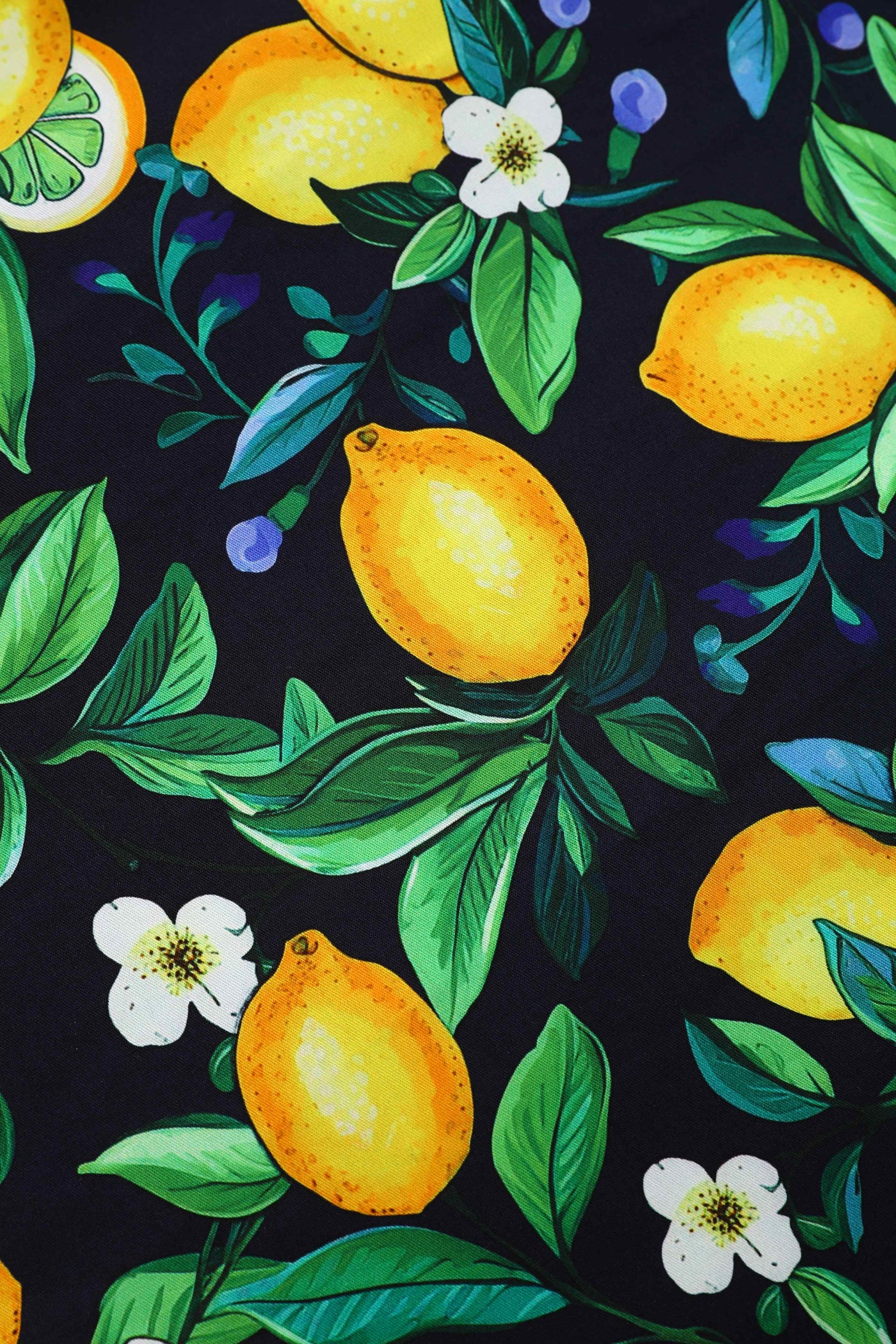 Close up view of Daisy Lemon Halter Dress In Black