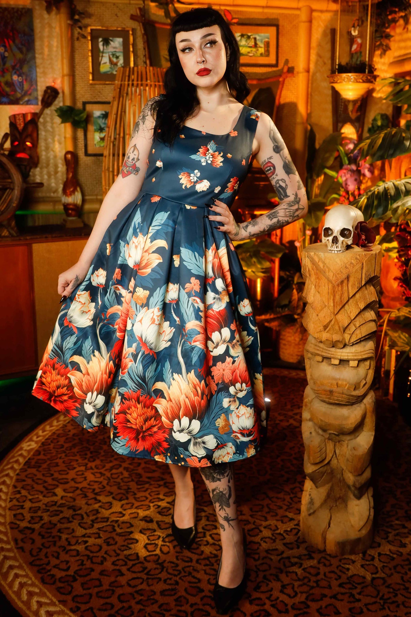 A model wearing a Dark Blue Flower Garden Swing Dress