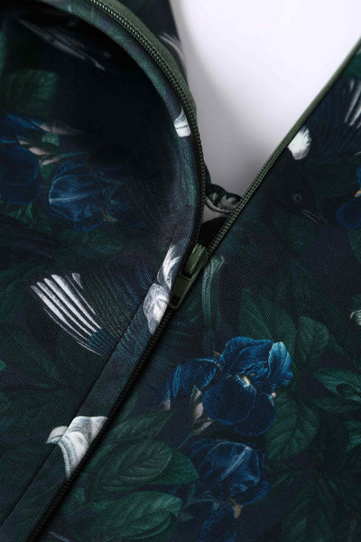 Close up view of Dark Green Off Shoulder Dress In Magpie Print