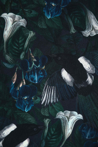 Close up view of Dark Green Off Shoulder Dress In Magpie Print