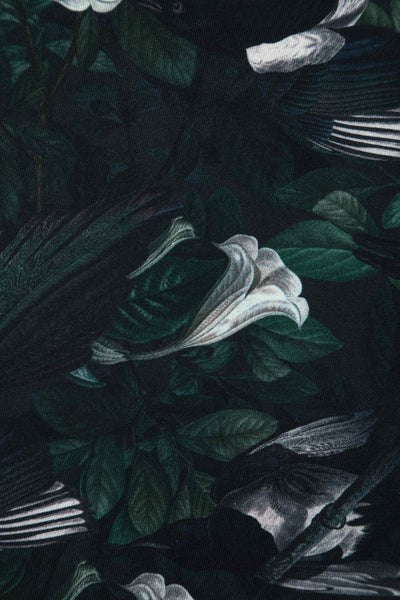 Close up view of Dark Green Off Shoulder Dress In Magpie Print