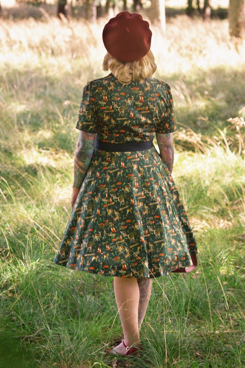 A model wearing a Dark Green Woodland Shirt Dress