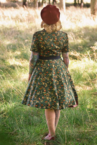 A model wearing a Dark Green Woodland Shirt Dress