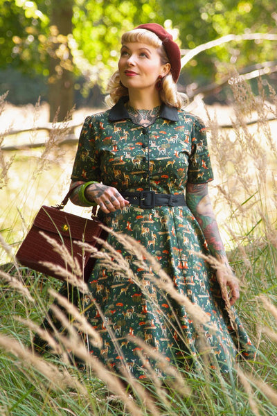 A model wearing a Dark Green Woodland Shirt Dress