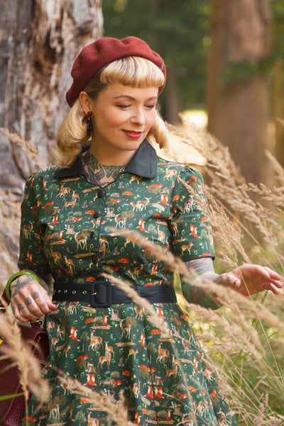 A model wearing a Dark Green Woodland Shirt Dress