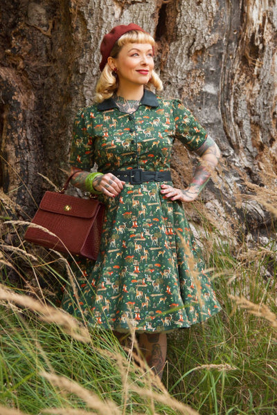 A model wearing a Dark Green Woodland Shirt Dress