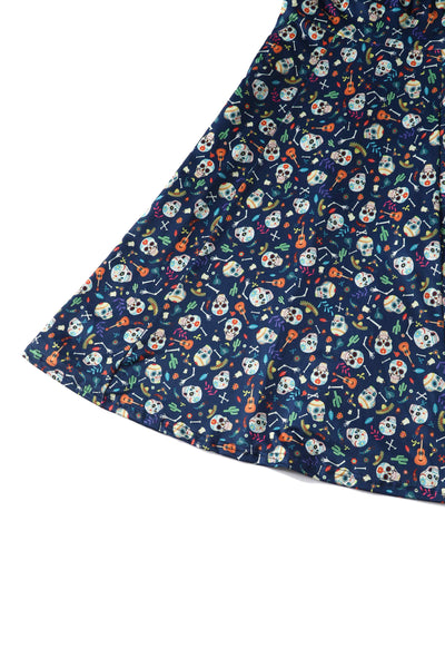 Close up View of Day of the Dead Sugar Skulls Print Dress in Navy Blue