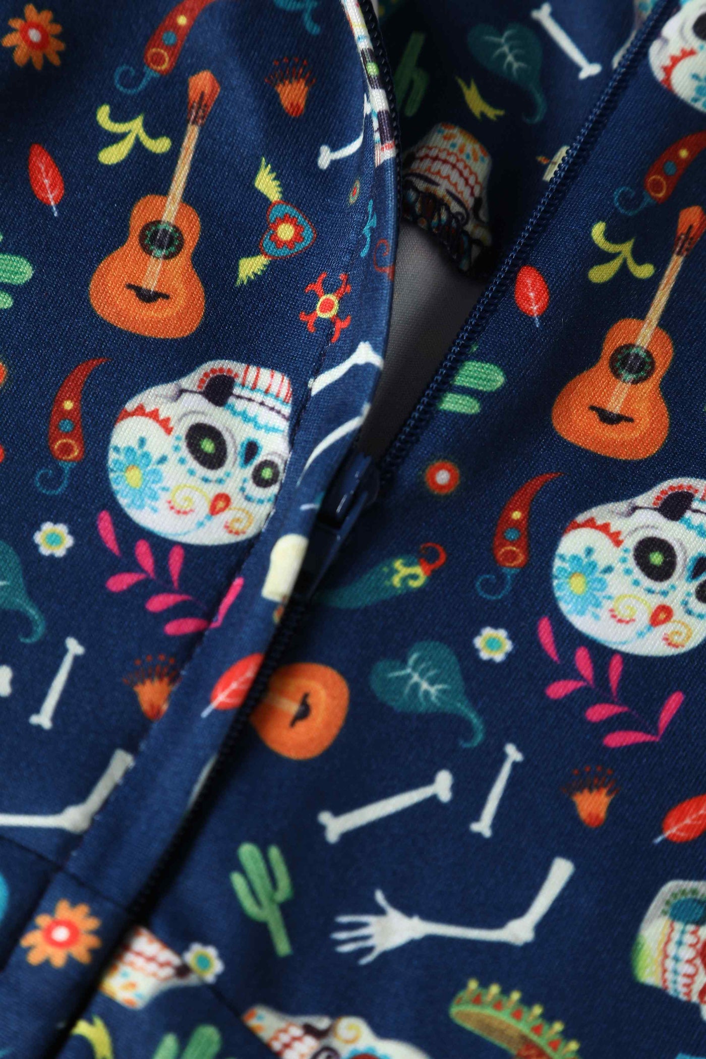 Close up View of Day of the Dead Sugar Skulls Print Dress in Navy Blue