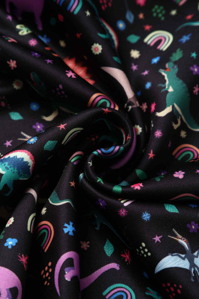 Close up view of Black Flared Dress in Dinosaur & Rainbow Print