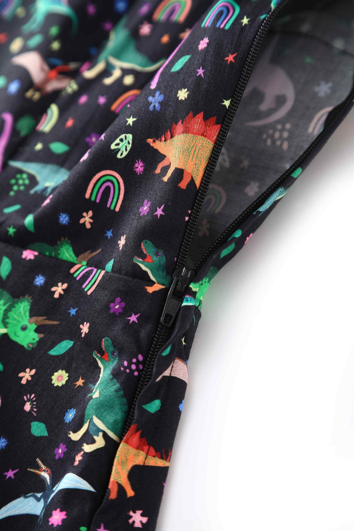 Close up  view of Dinosaur & Rainbow Midi Shirt Dress In Black