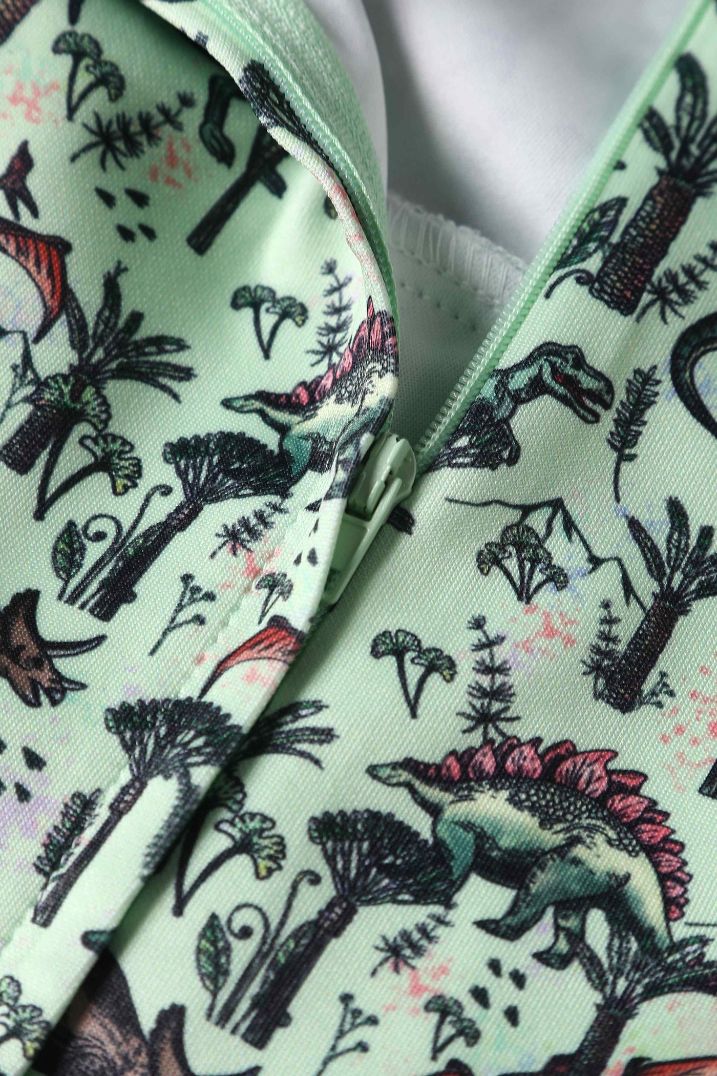 Close up View of Dinosaur Green Flared Dress in Light Green