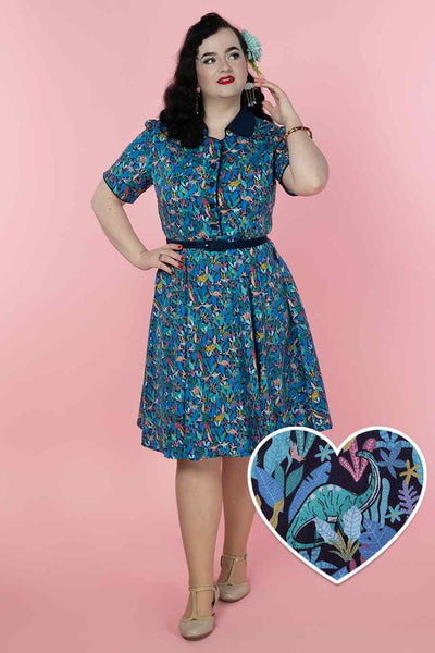 A model wearing a Dinosaur Shirt Dress in Navy Blue
