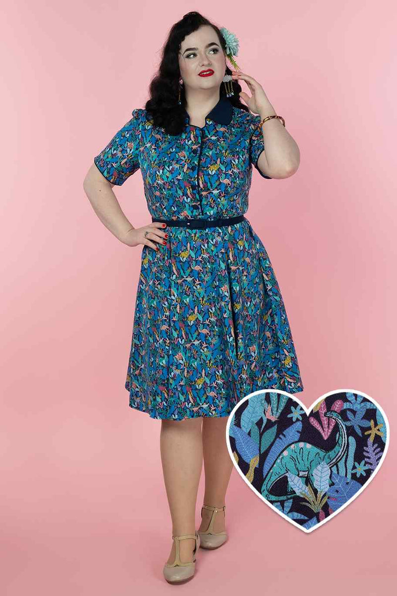 A model wearing a Dinosaur Shirt Dress in Navy Blue