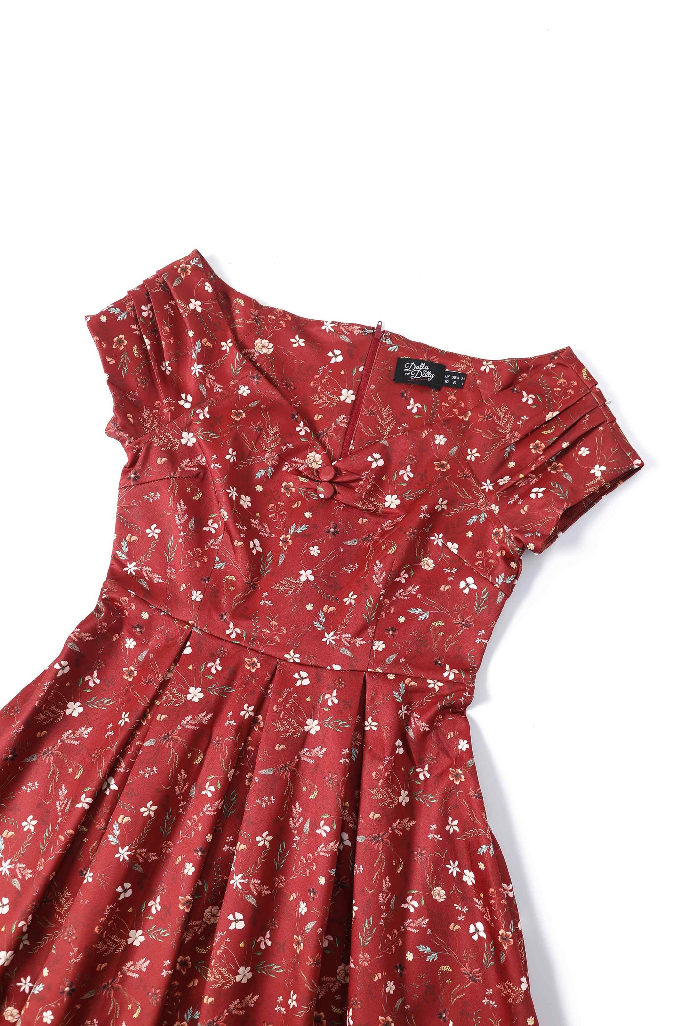 Close up view of Ditsy Floral Off Shoulder Dress In Red