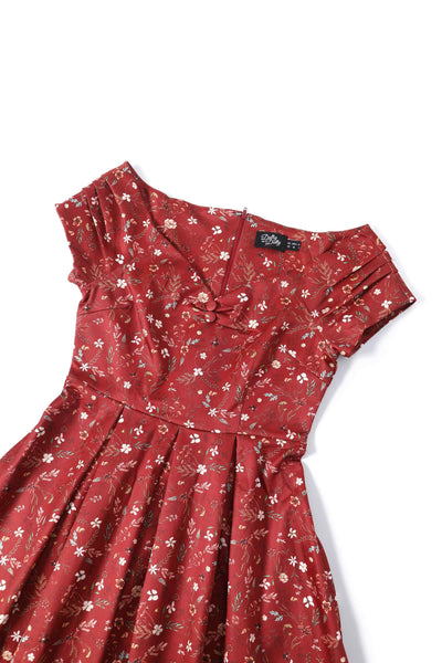 Close up view of Ditsy Floral Off Shoulder Dress In Red