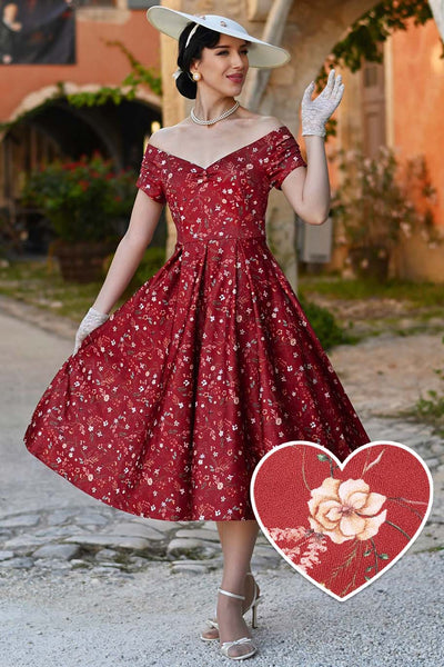 A model in Lily Ditsy Floral Off Shoulder Dress In Red