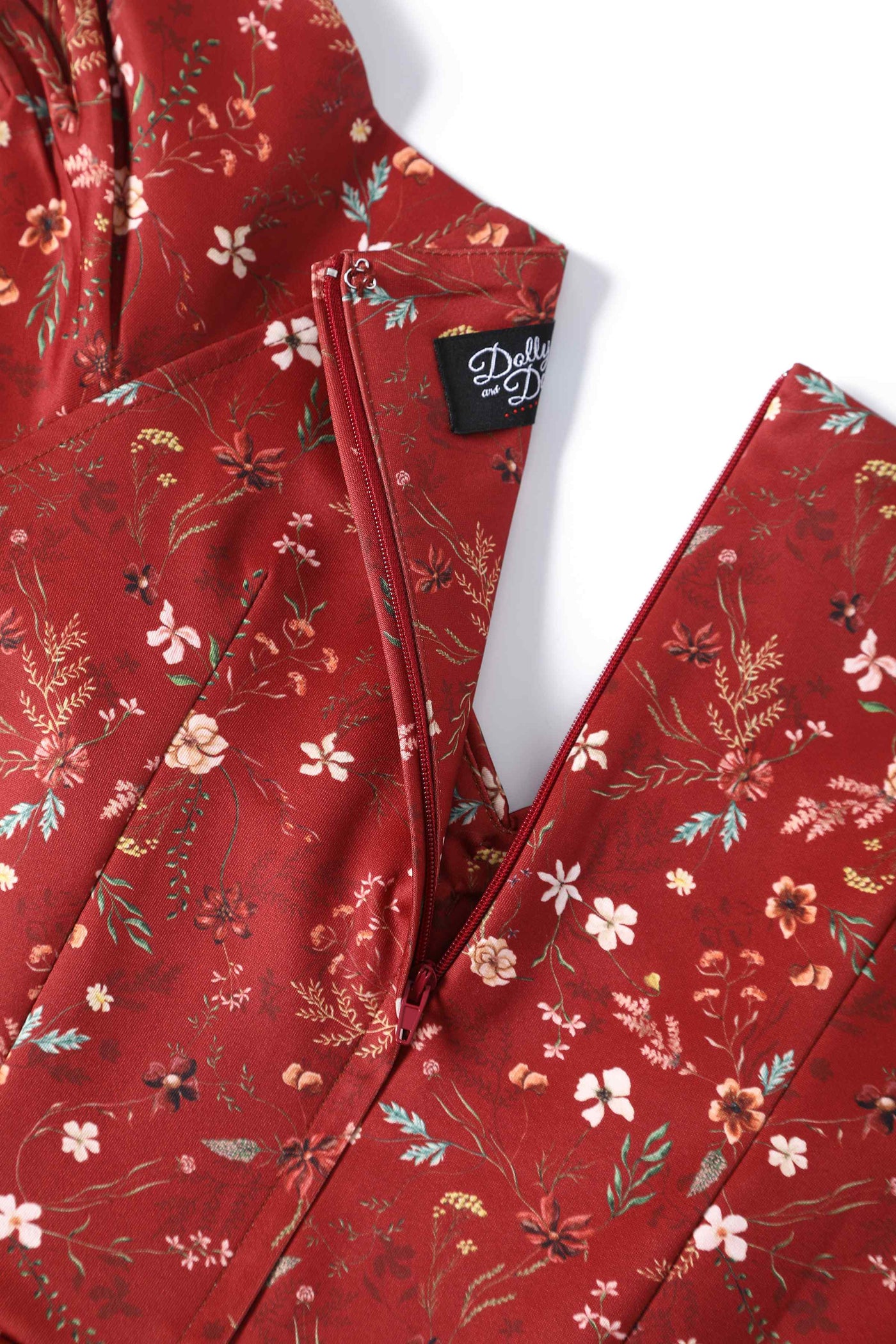 Close up view of Ditsy Floral Off Shoulder Dress In Red
