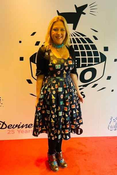 A lady wearing a Dog Frame Circle Dress In Navy Blue
