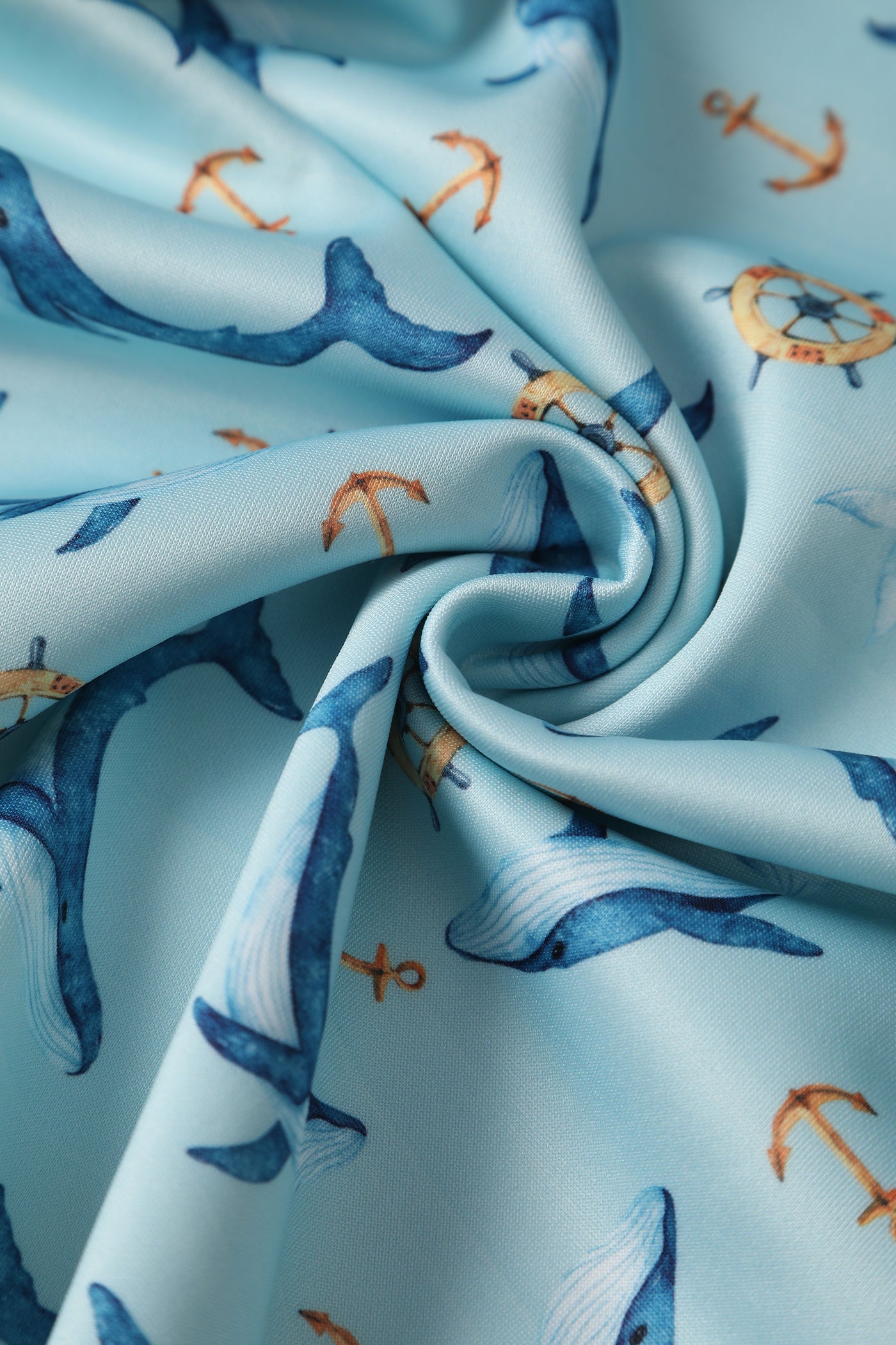 Close up view of Dolphin Swing Dress In Aqua Blue