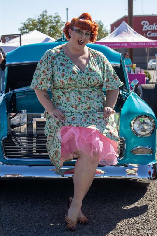 A lovely lady wearing a Donna Green Squirrel Woodland Tea Dress