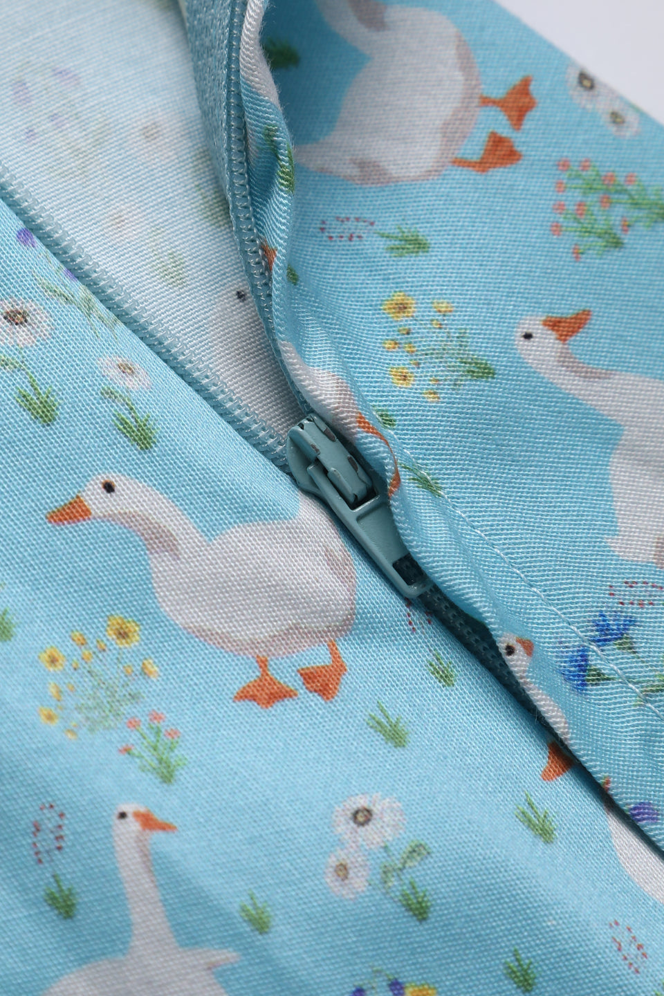 Close up view of Duck Farm Shirt Dress In Light Blue