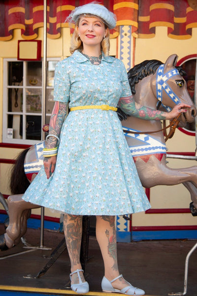 A model wearing a Duck Farm Shirt Dress In Light Blue