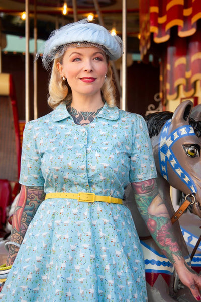 A model wearing a Duck Farm Shirt Dress In Light Blue
