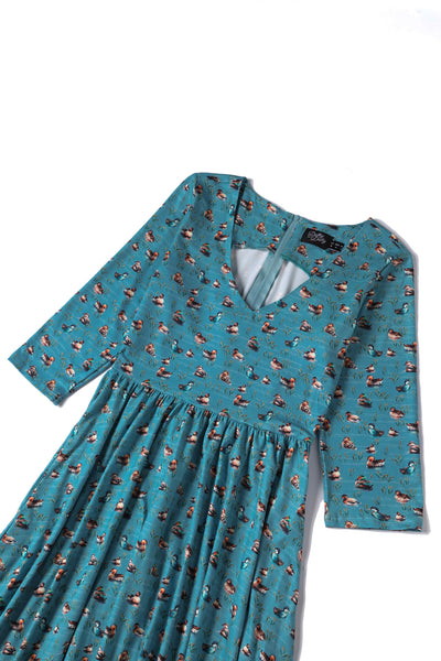 Close up View of Duck Print Long Sleeved Swing Dress in Blue