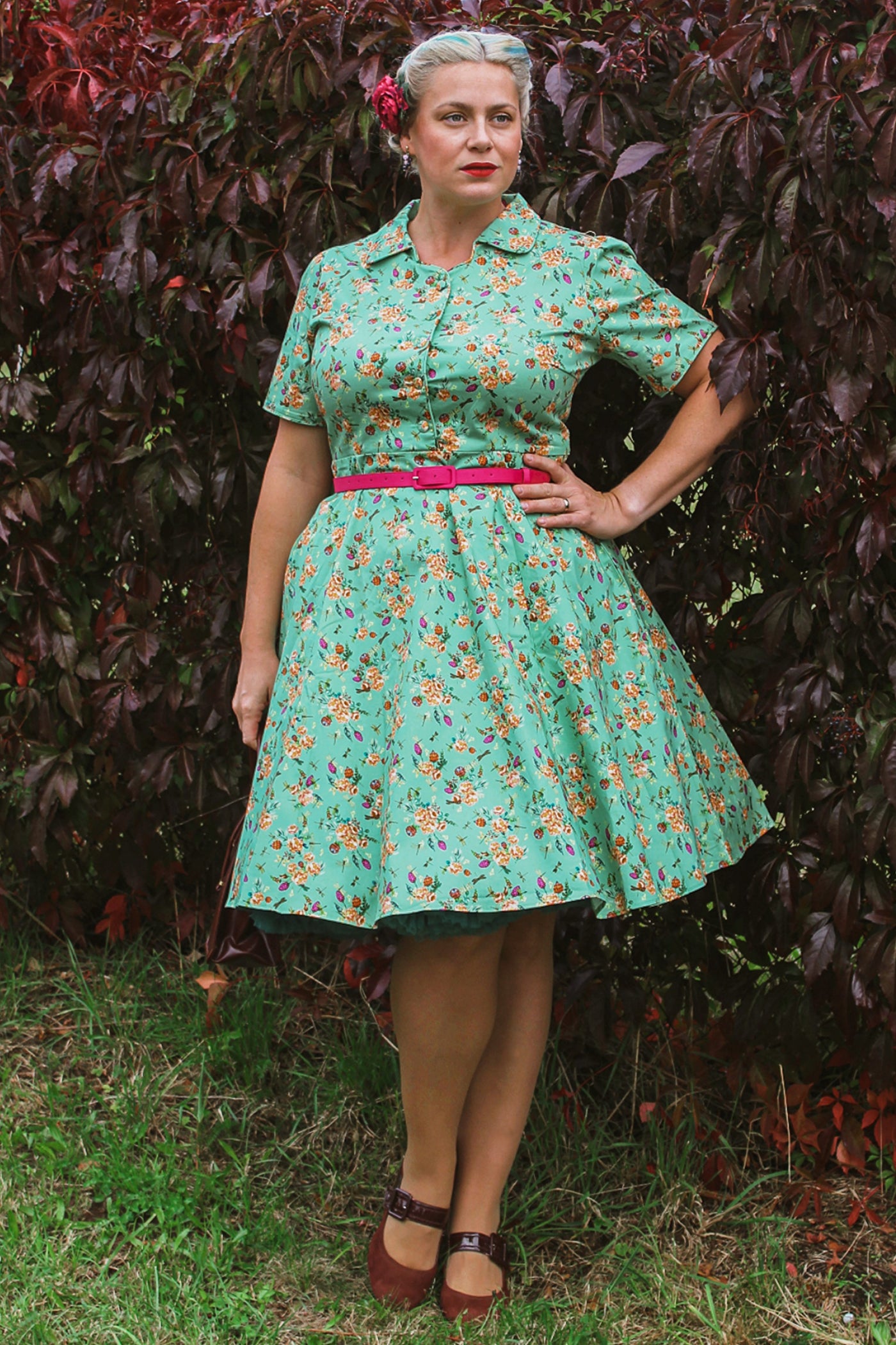 A model wearing a Mint Green Floral Shirt Dress