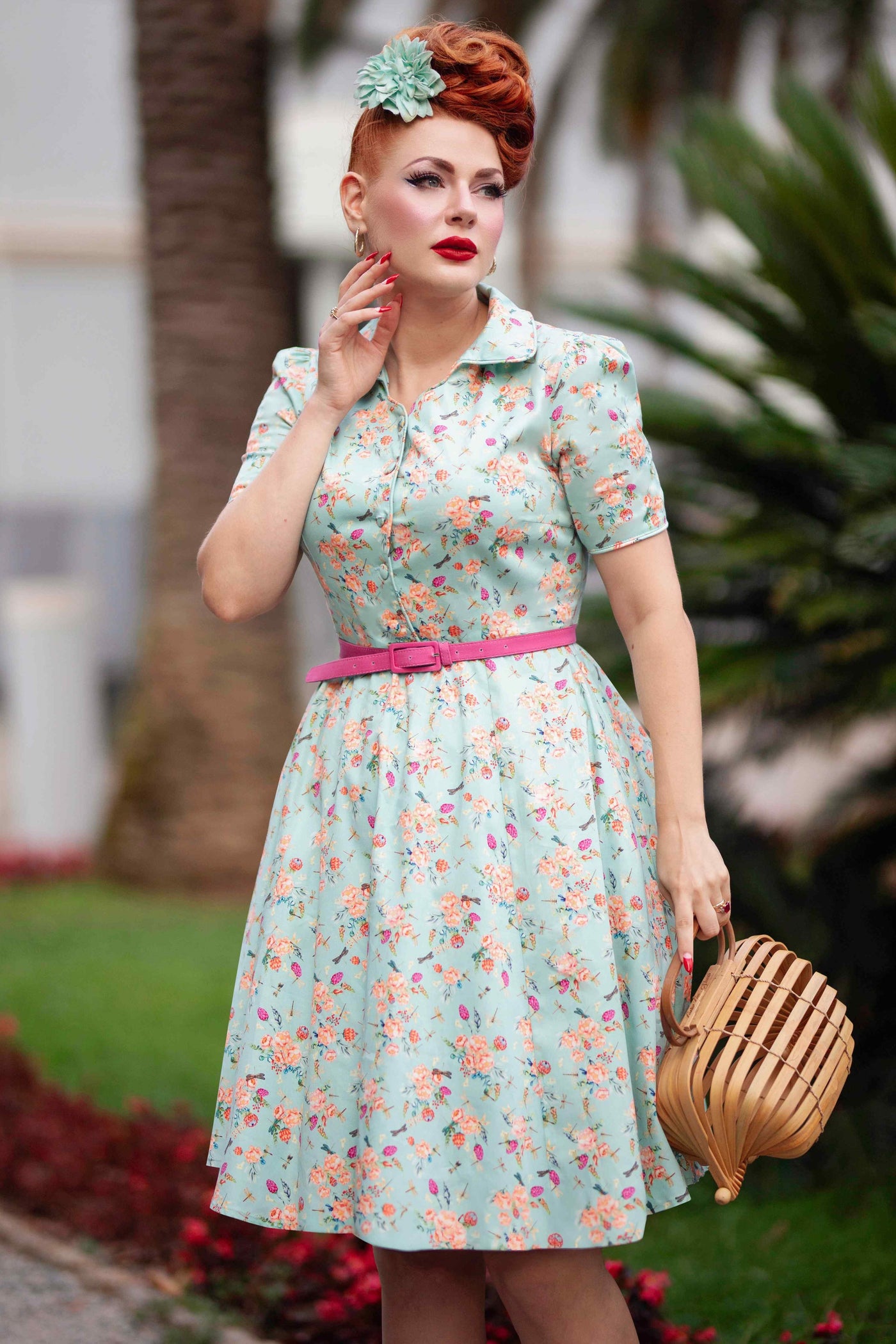 A model wearing a Mint Green Floral Shirt Dress