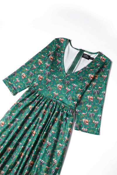 Close up view of Elephant Print Flared Dress in Green