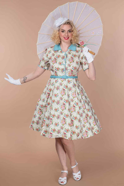 A model wearing a English Garden Shirt Dress In White
