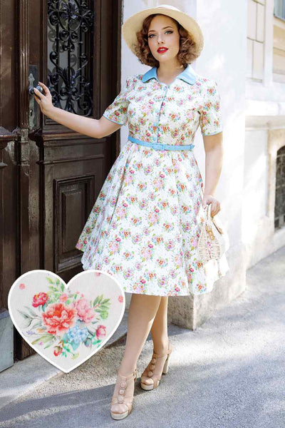 A model wearing a English Garden Shirt Dress In White