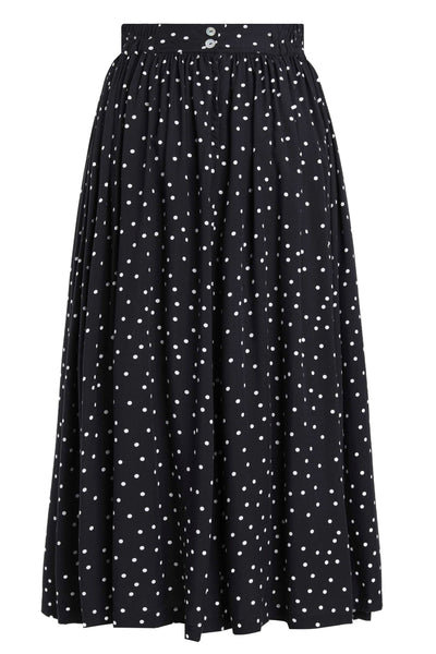 Back view of Estelle Black Polka Dot Midi Skirt