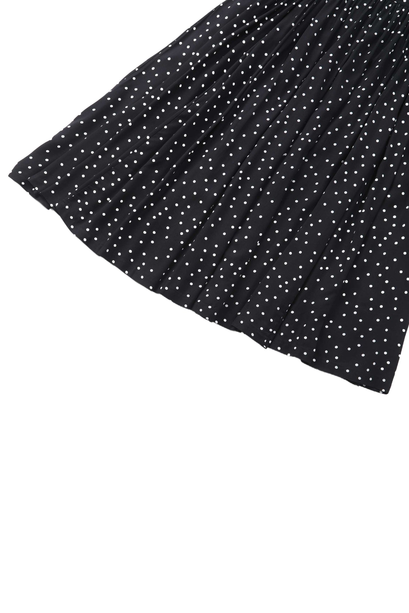 Close up view of Estelle Black Polka Dot Midi Skirt