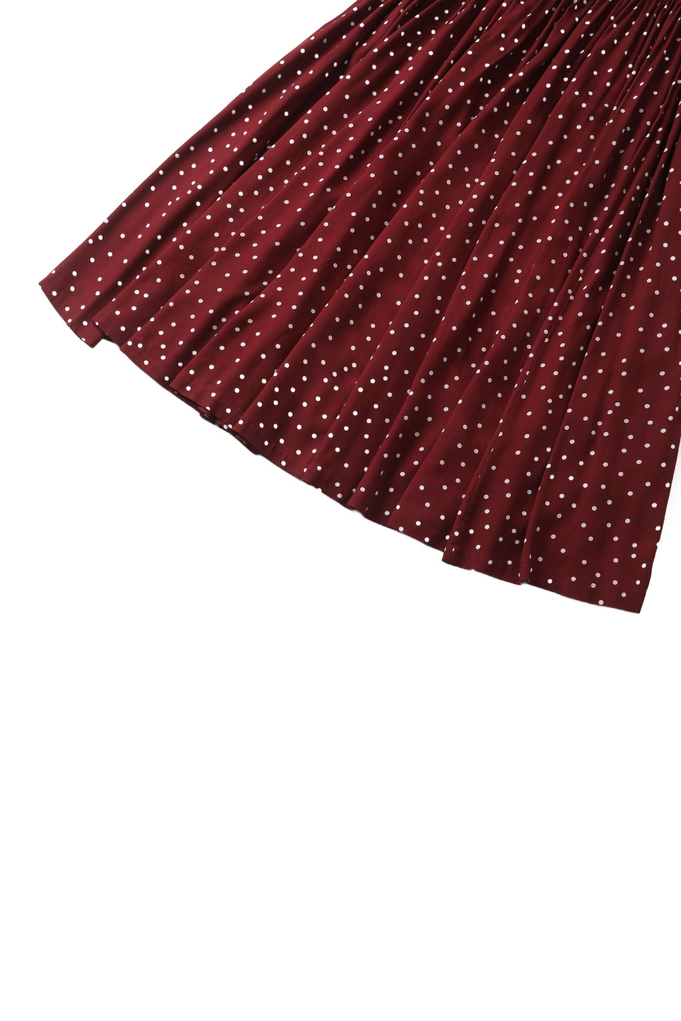 Close up view of Estelle Burgundy Polka Dot Midi Skirt