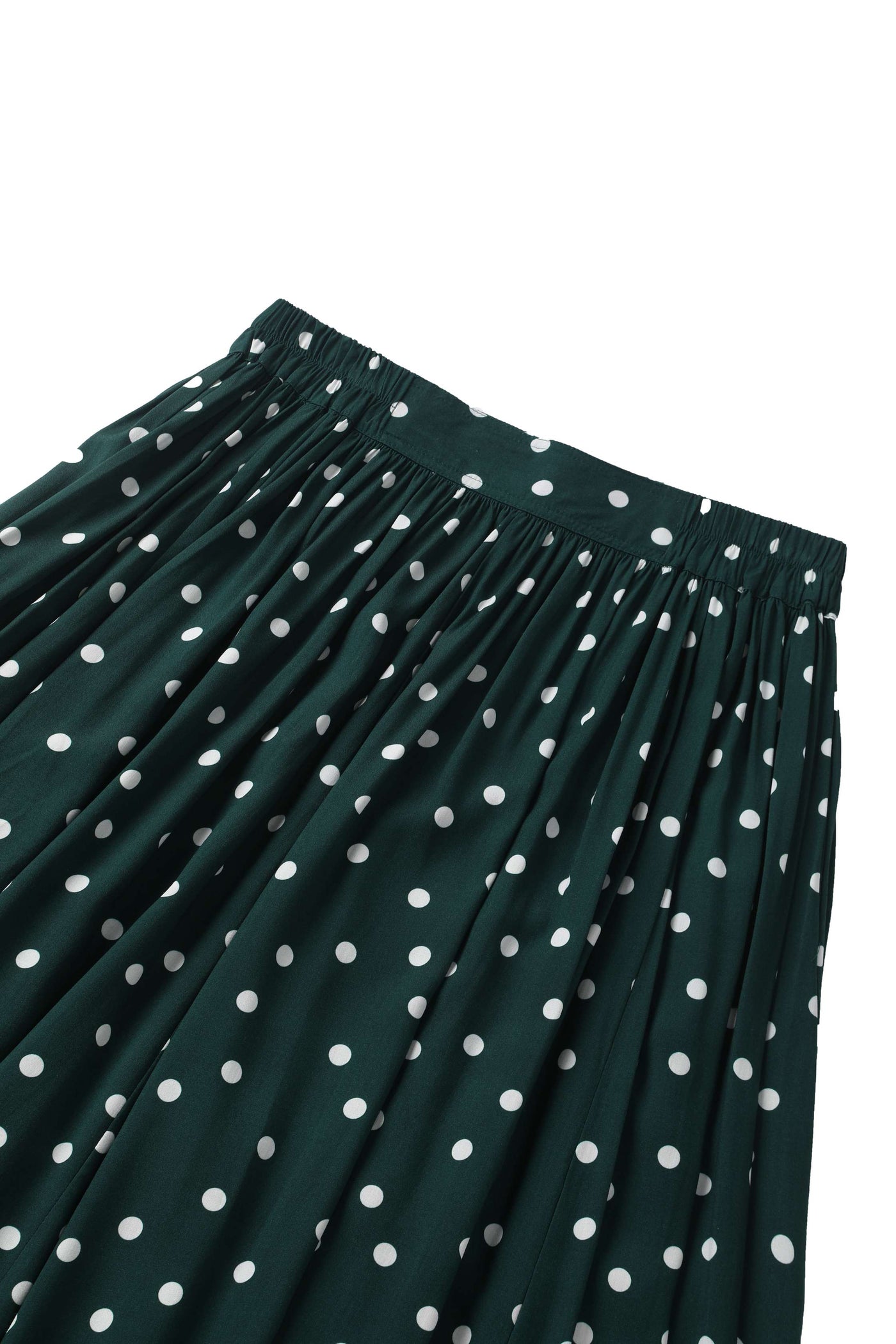 Close up view of Estelle Green Polka Dot Midi Skirt