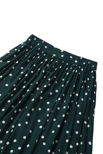 Close up view of Estelle Green Polka Dot Midi Skirt