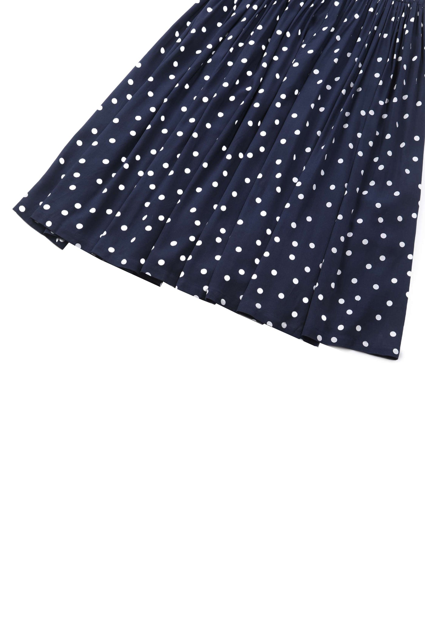 Close up view of Estelle Midnight Blue Polka Dot Midi Skirt