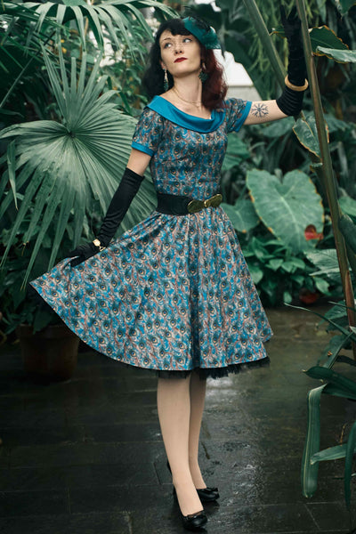 A model wearing a Peacock Feather Swing Dress