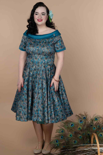 A model wearing a Peacock Feather Swing Dress