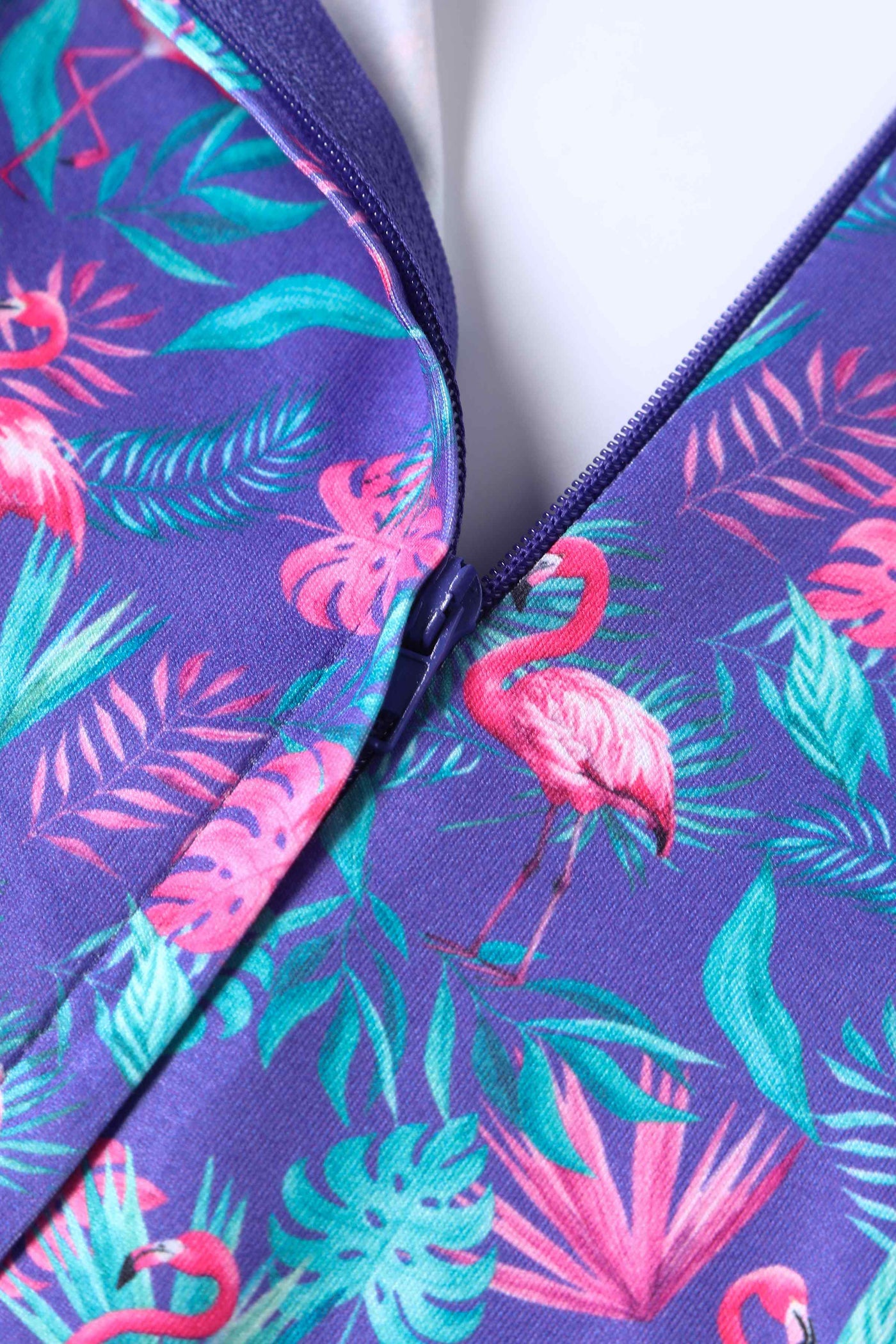 Close up view of Flamingo Long Sleeved Dress in Purple